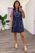 navy blue with cream trim sleeveless v neckline short dress