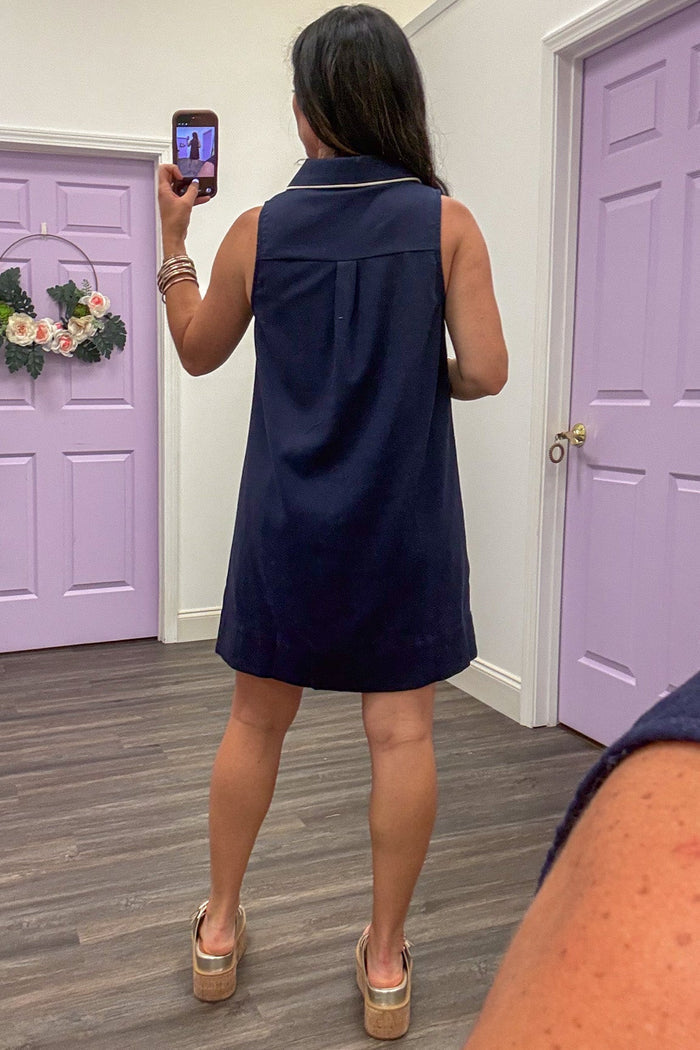 classy navy blue with cream trim sleeveless v neckline short dress