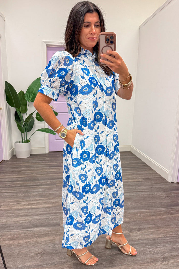 white and blue floral print button front eyelet midi dress with side pockets