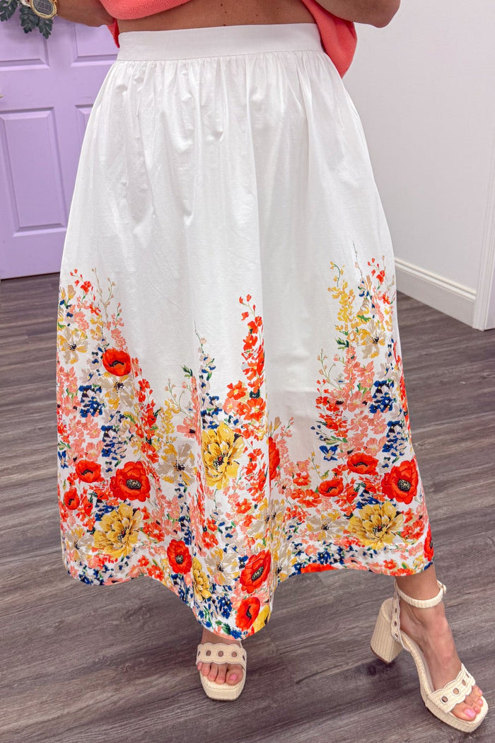bright floral asymmetrical print flowy poplin off white midi skirt