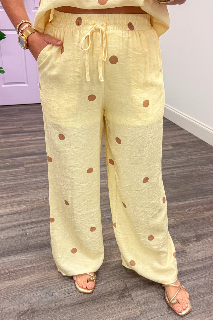 pale yellow with light brown polka dot print wide leg pants with front pockets