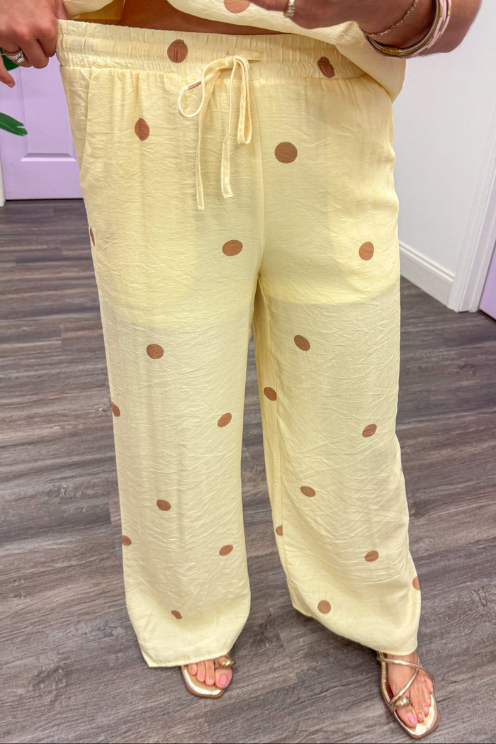 yellow with brown polka dot print  elastic drawstring waistband wide leg pants
