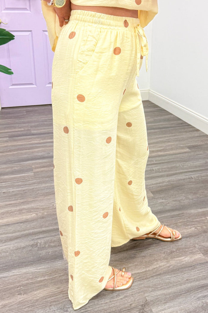 pale yellow with light brown polka dot print shorts lined wide leg pants