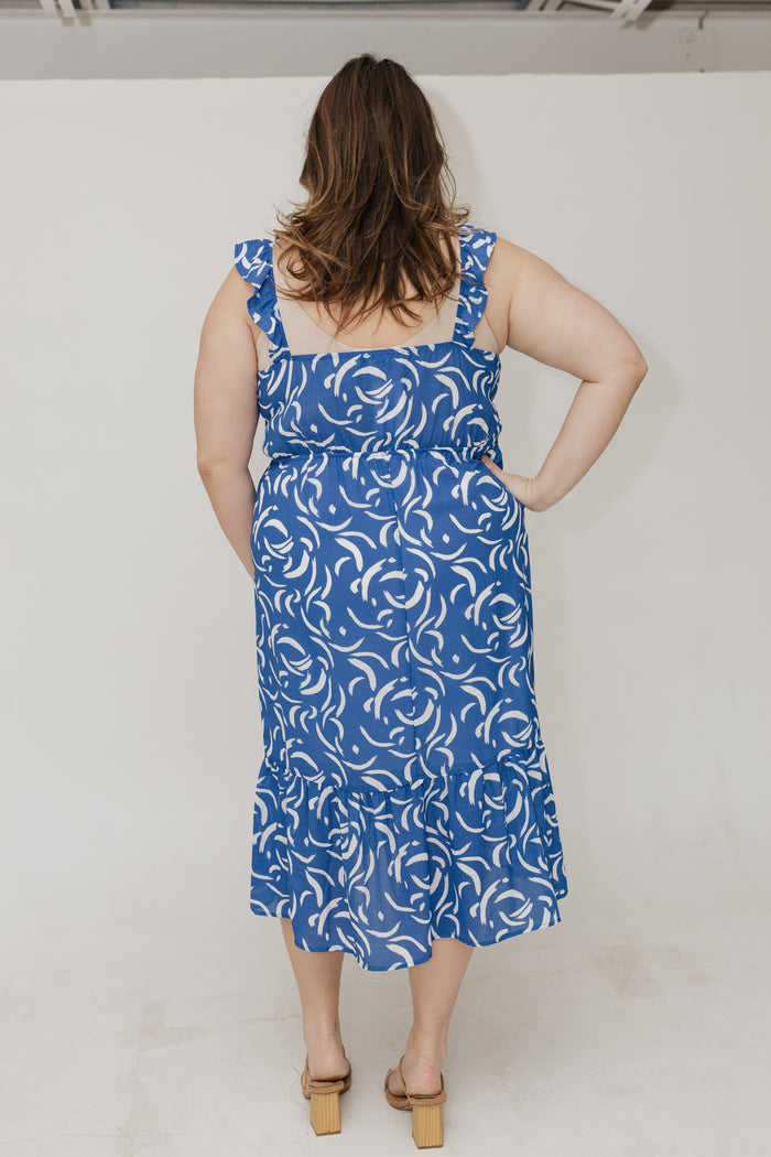 RUFFLE STRAP KICK HEM ABSTRACT PATTERN MIDI DRESS