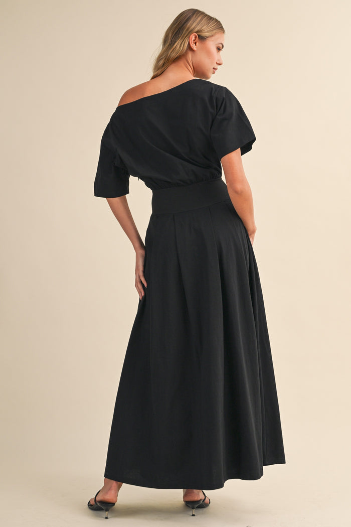 Black midi dress with boat neck and cinched waist by Klesis in comfy cotton fabric